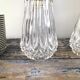 Set of two electrified chiseled glass sconces to nine