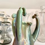Turquoise glazed ceramic pitcher