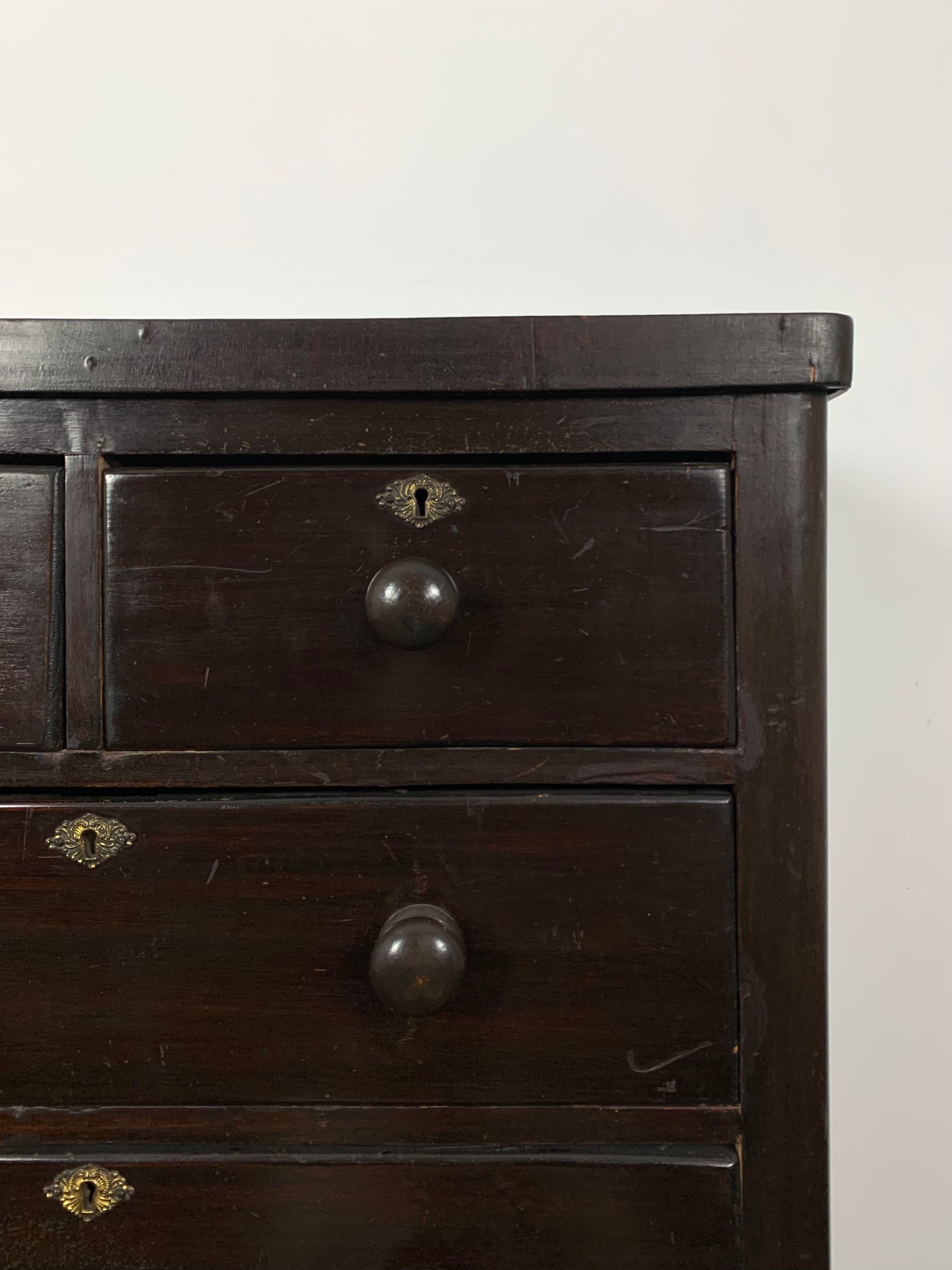 Dark antique chest of drawers