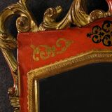 Miroir toscan laqué et doré du XXe siècle