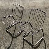 Two chairs in chrome metal