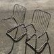 Two chairs in chrome metal