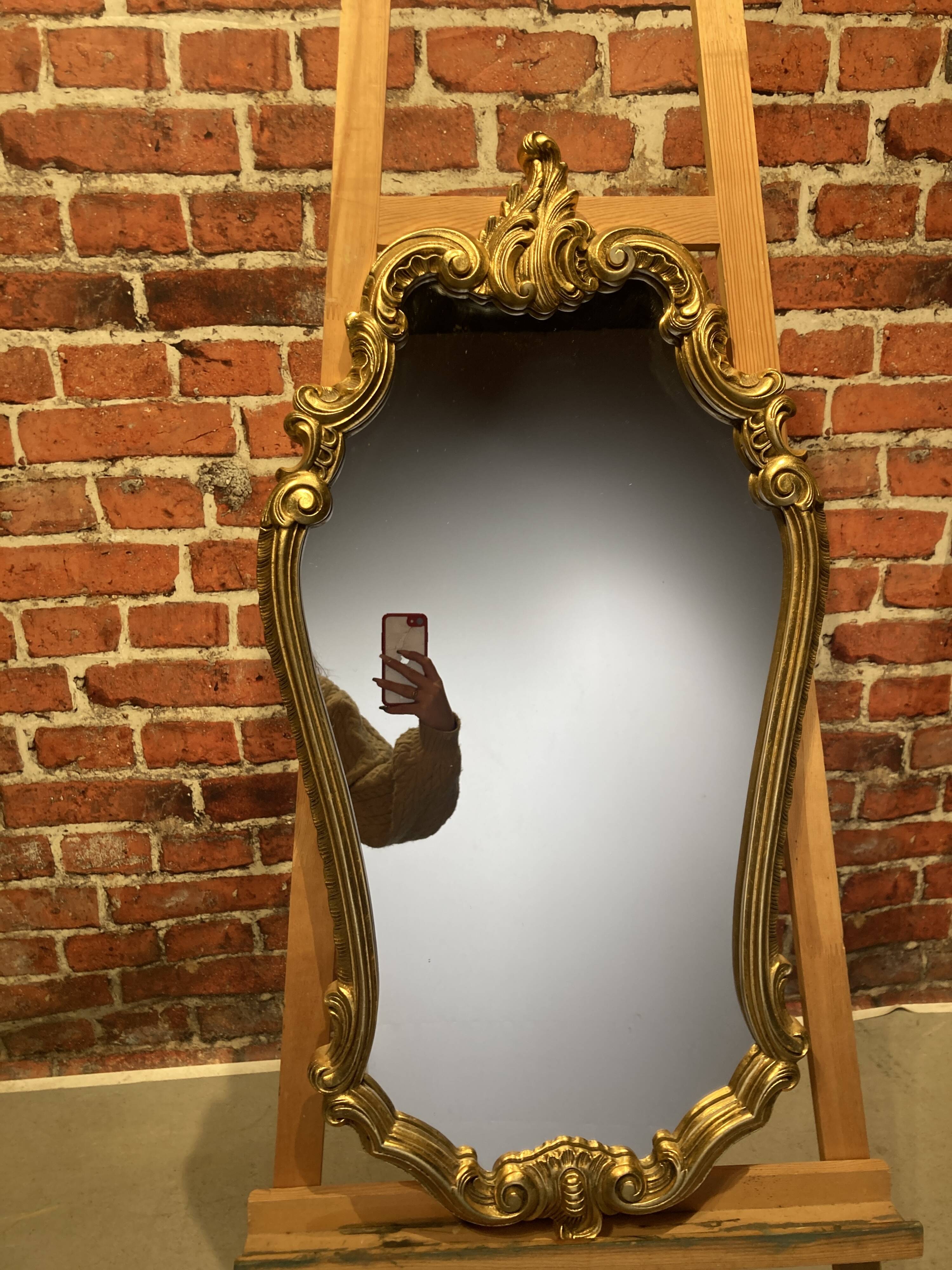 Wooden mirror with moldings