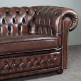 Chesterfield sofa in cowhide, 4 seats