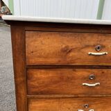 Antique 19th-century wooden chest of drawers with a marble top