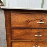 Antique 19th-century wooden chest of drawers with a marble top