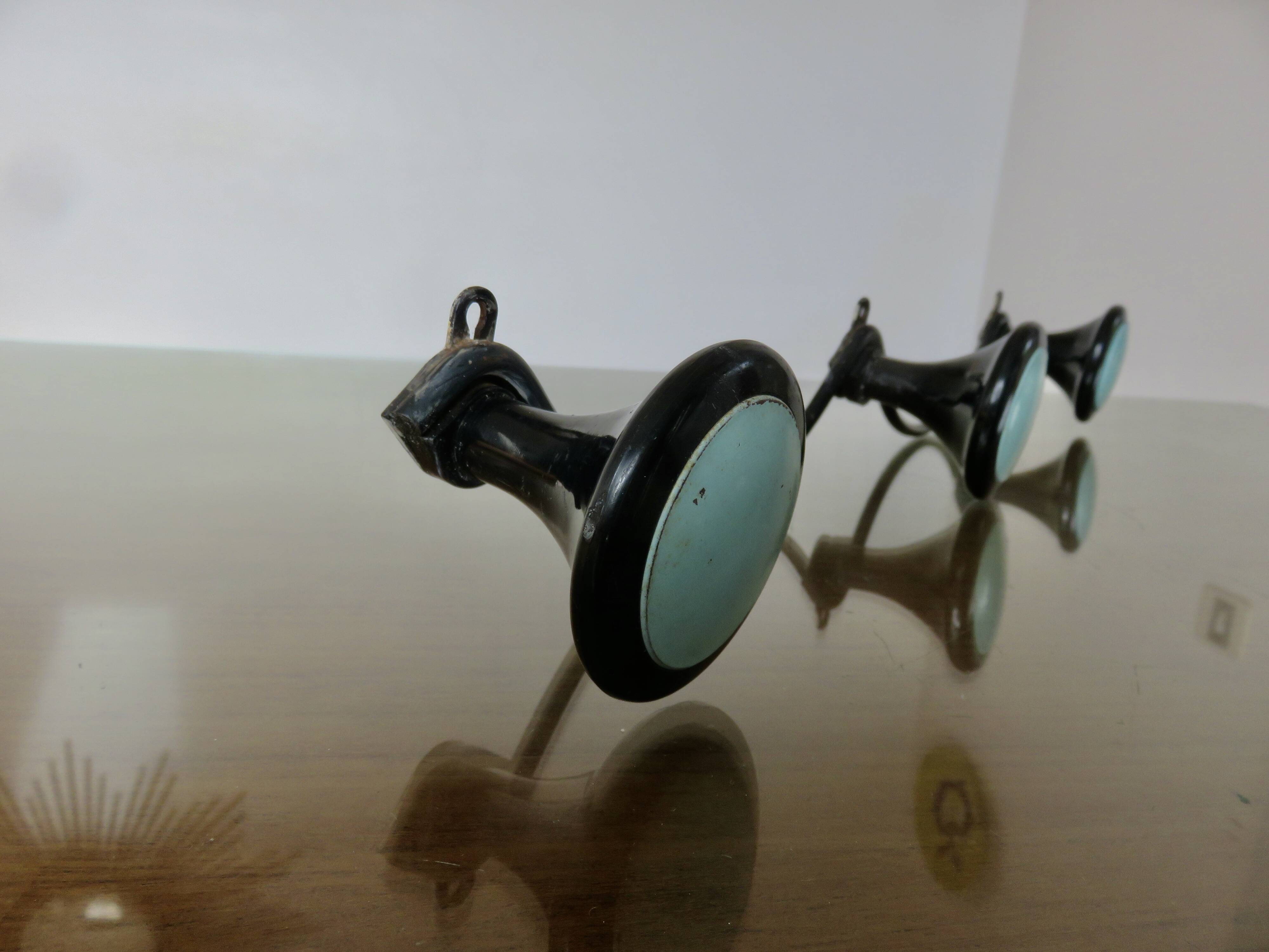 Wall-mounted coat rack, 3 hooks in Bakelite and metal, 1950s/60s