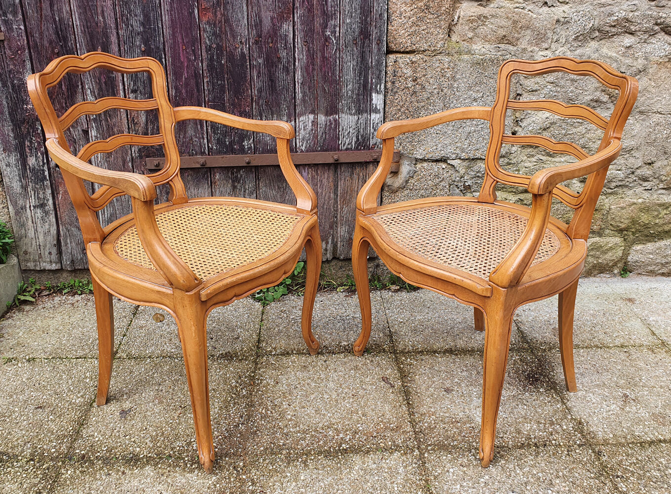 Pair of blond wood cane armchairs from the 60s