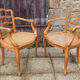 Pair of blond wood cane armchairs from the 60s