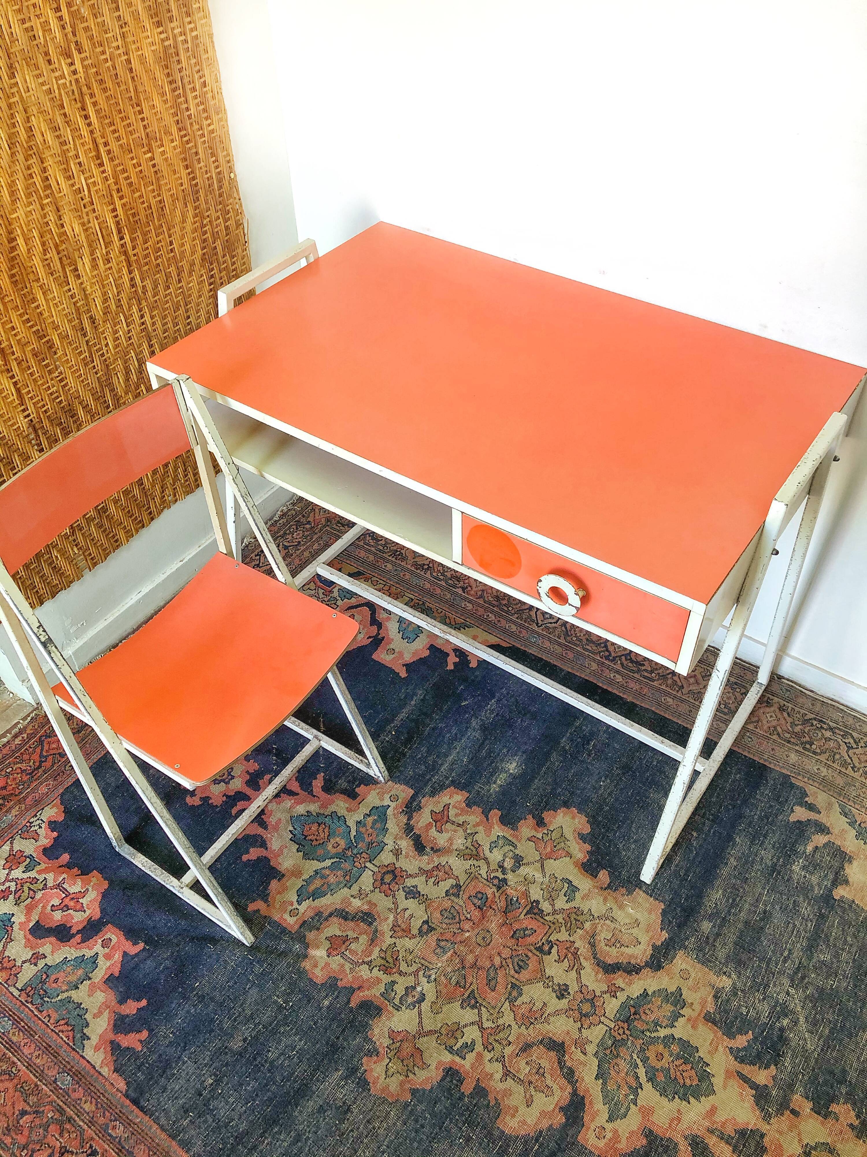 Vintage desk and chair in orange formica