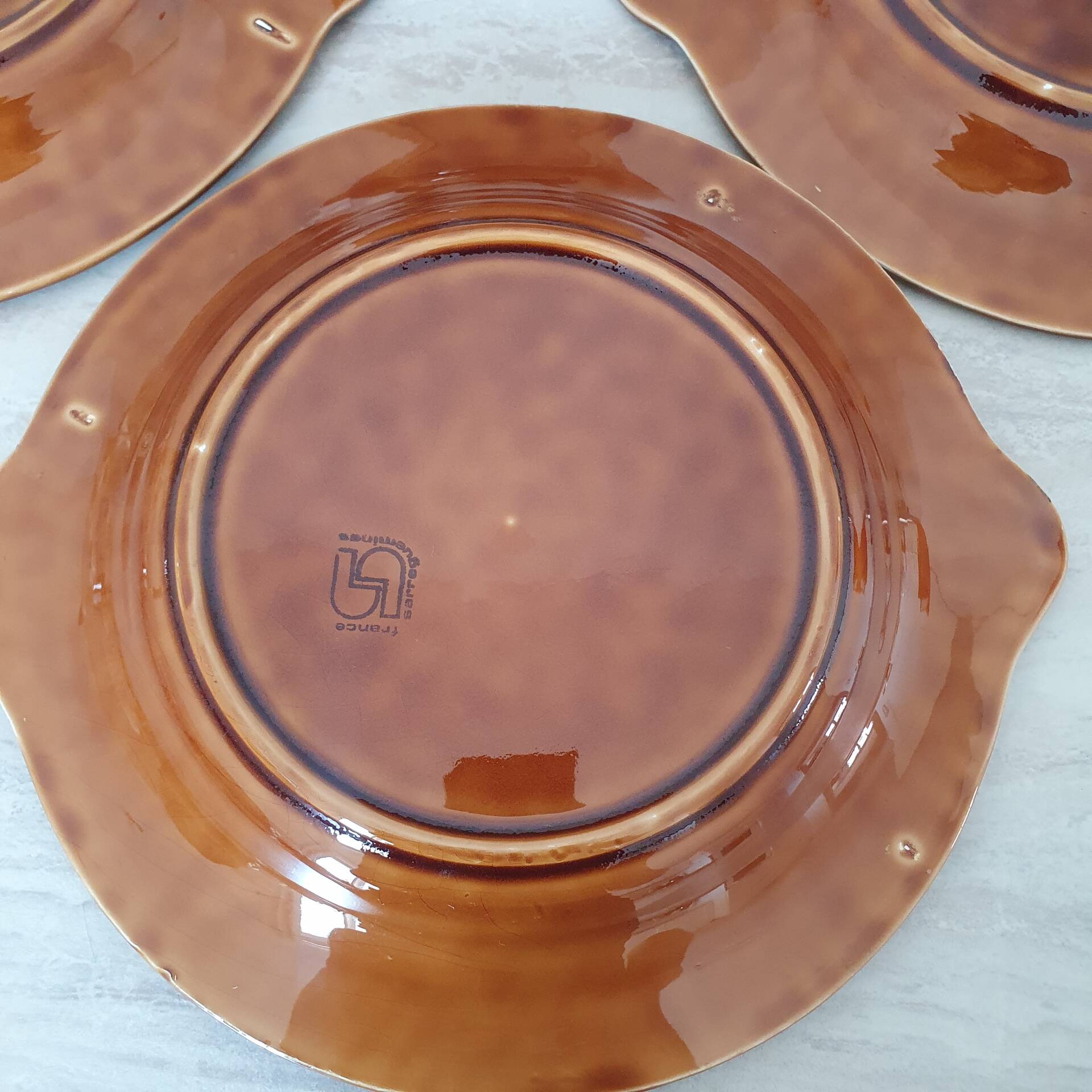 Sarreguemines / 4 ceramic fish-shaped plates in Barb porcelain.