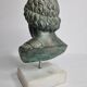 Bust of Esculape in patinated plaster on marble base, 21 cm