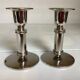 Pair of silver metal candlesticks