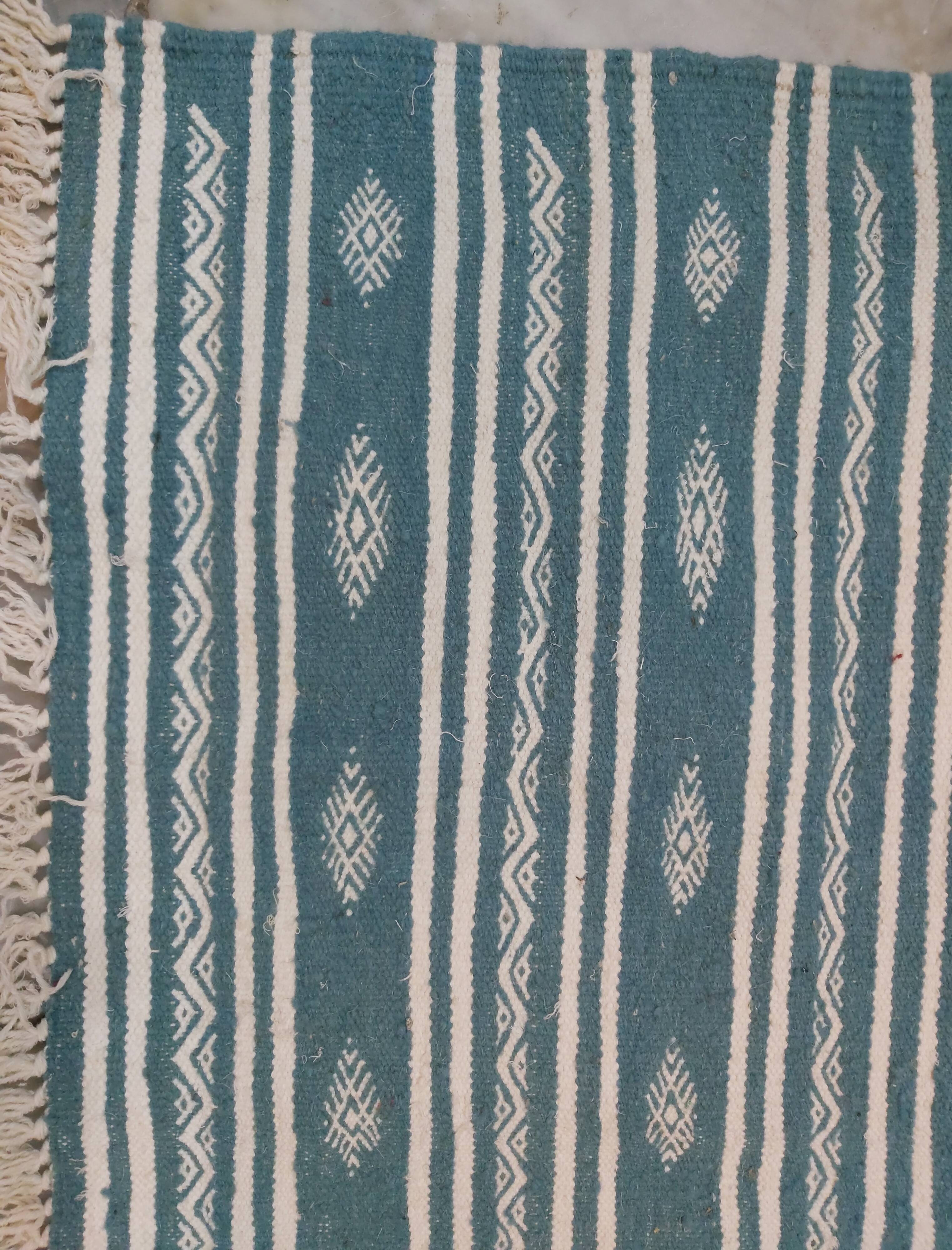 Handmade blue and white Berber carpet in pure wool