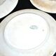 Onnaing Faïencerie set of 4 Coppelia plates with green floral decoration, iron earthenware