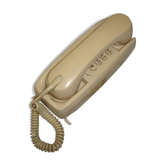 Ancien téléphone mural à touches datant des années 80