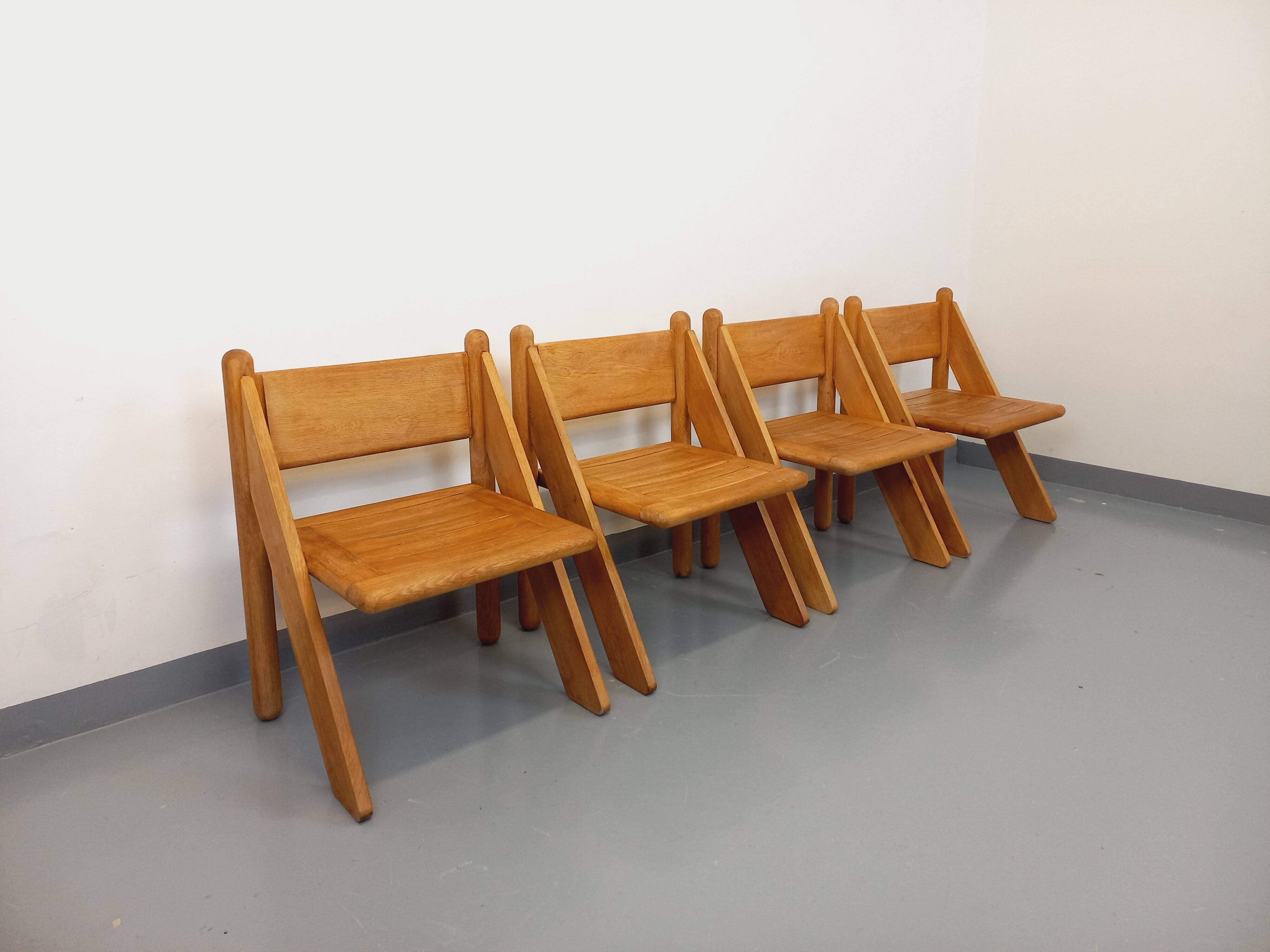 Set of 4 vintage brutalist chairs in solid oak from the 1960s.