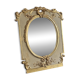 Napoleon III mirror in carved gilded wood, oval mercury glass.