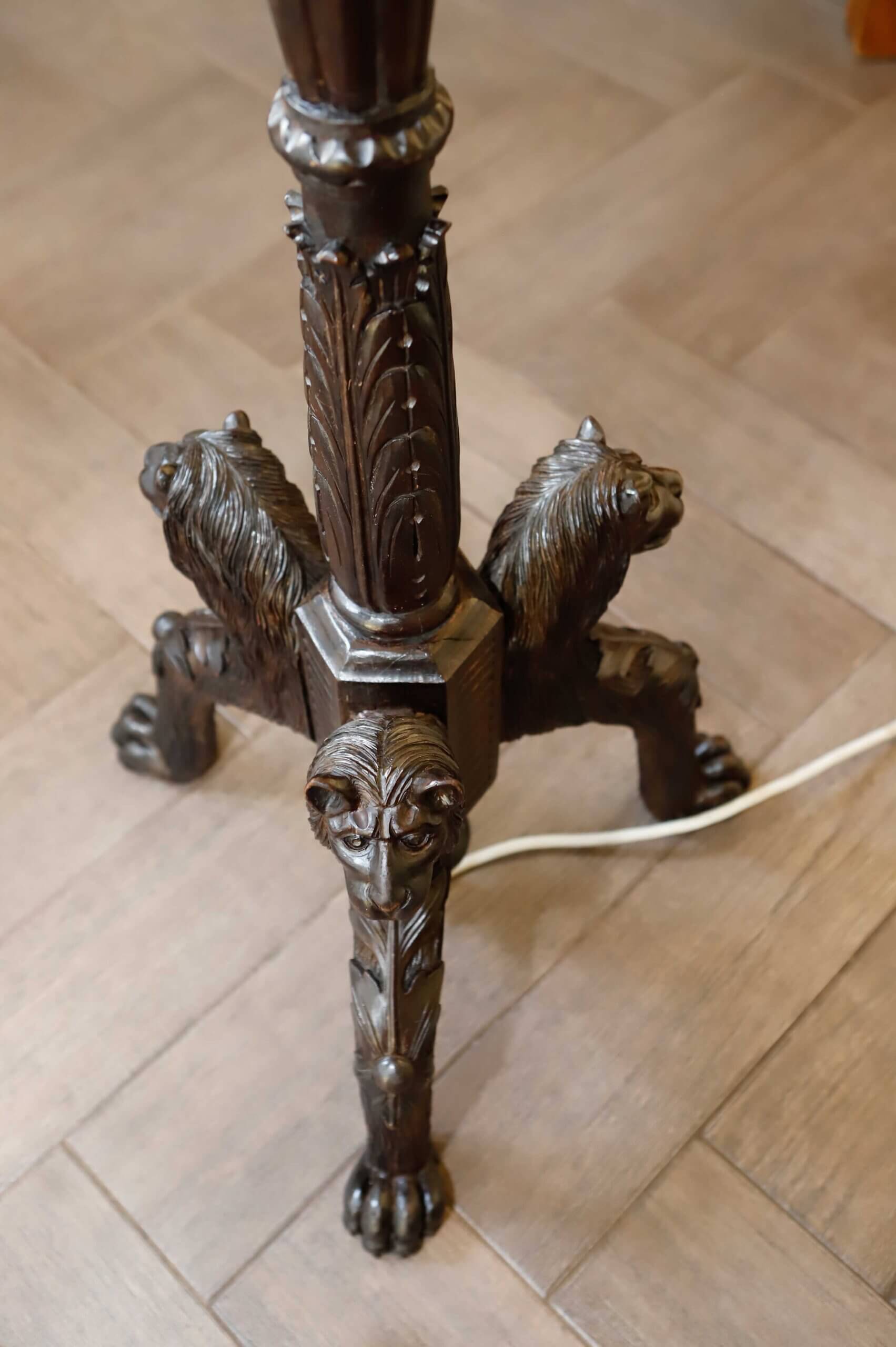 Antique floor lamp with lion motif