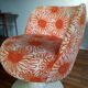 Chaise orange pivotante années 60/70