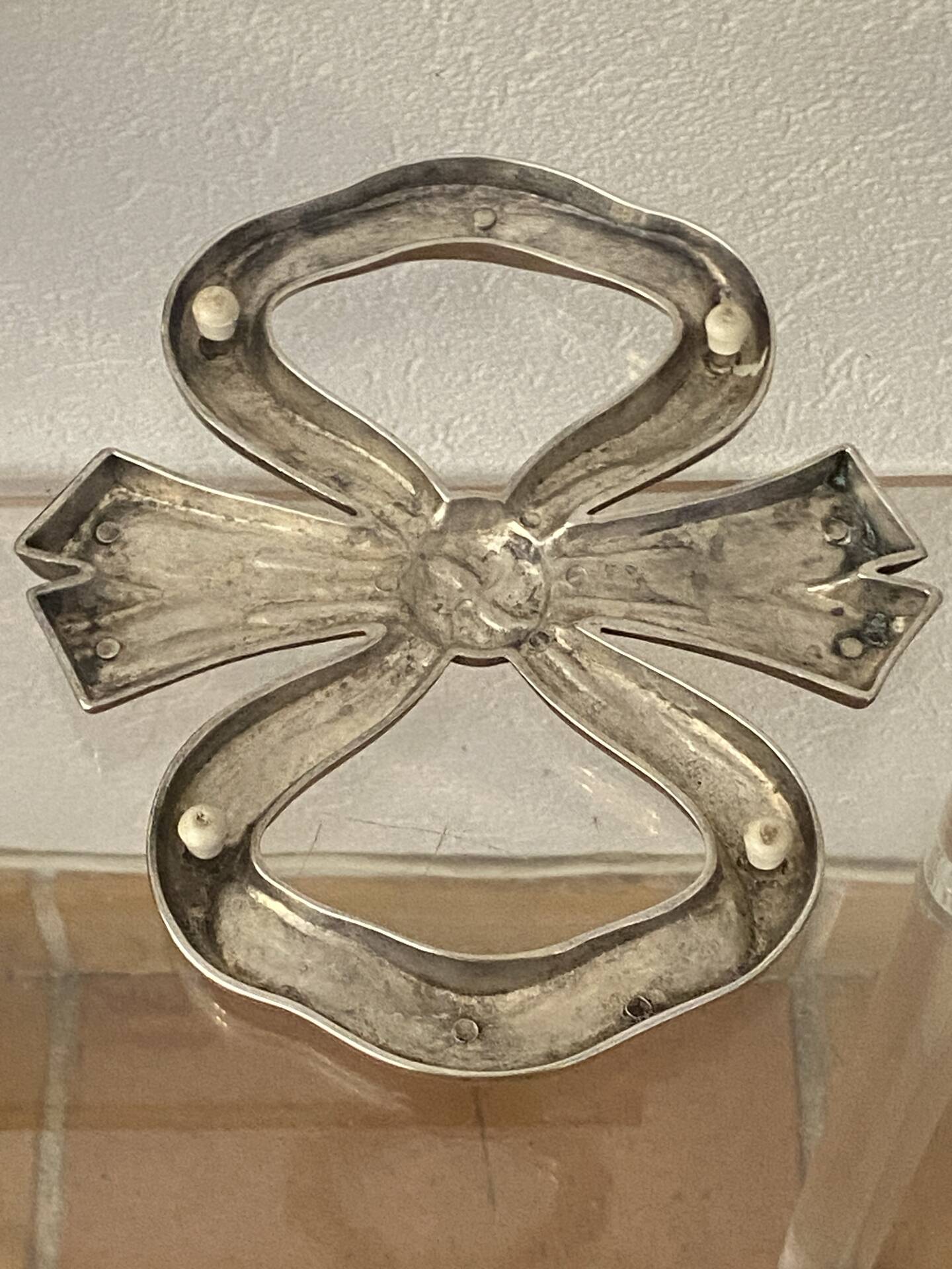 Lancel trivet, bow and ribbon, silver-plated metal