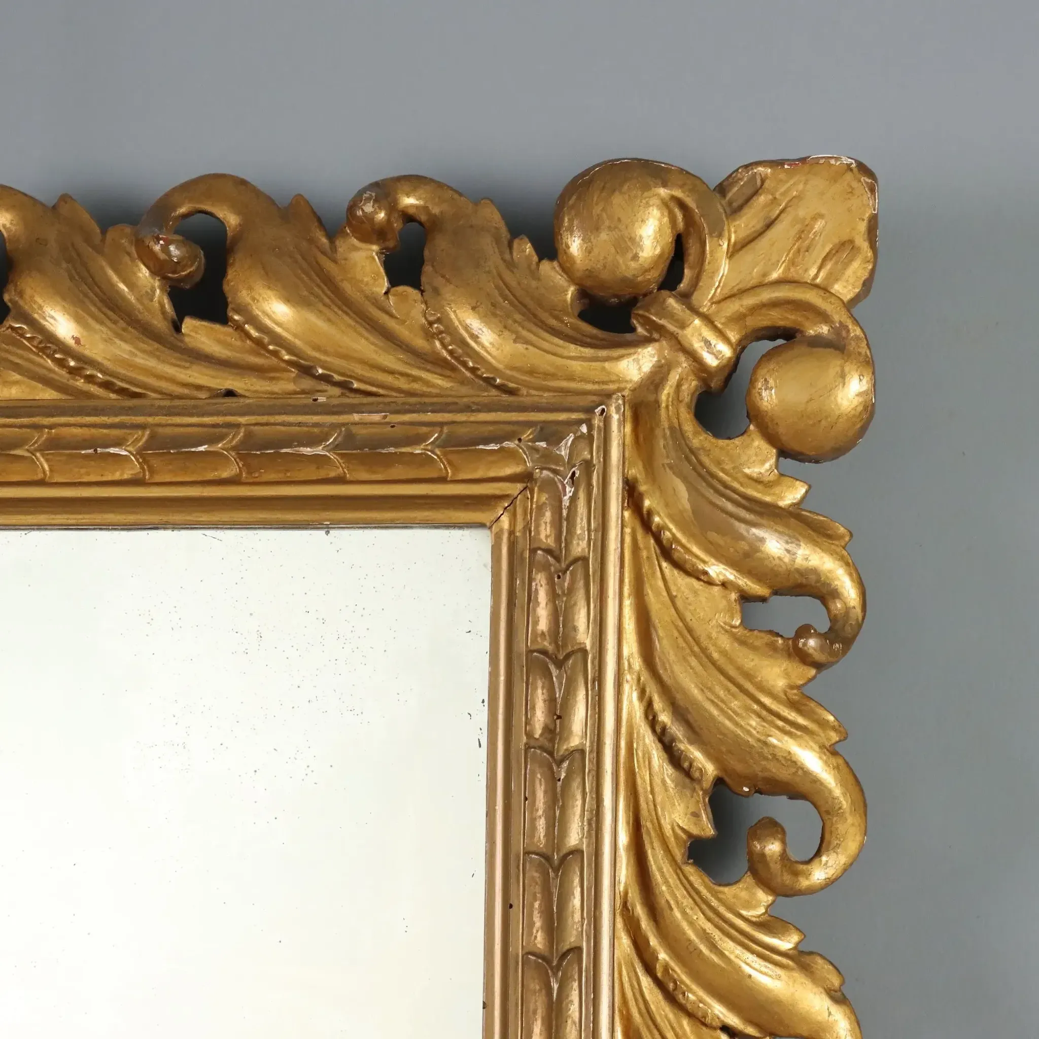 Eclectic antique mirror in carved and gilded wood, Italy, 20th century