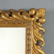 Eclectic antique mirror in carved and gilded wood, Italy, 20th century