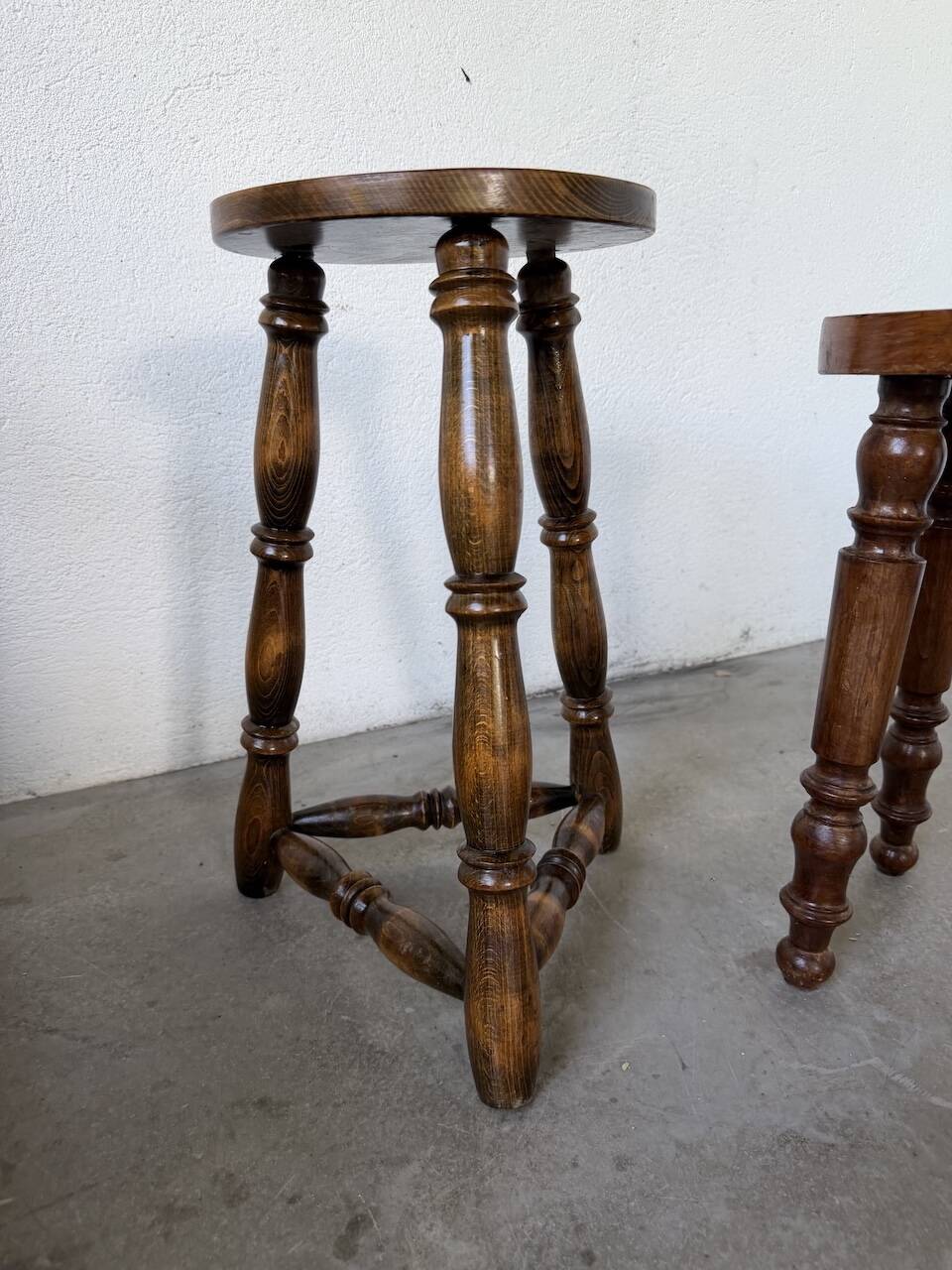 Pair of antique stools with turned legs.