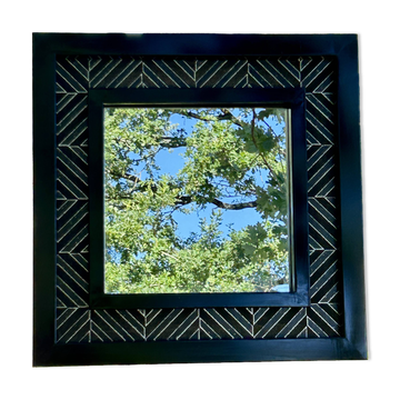 Superb contemporary mirror in metal and geometric ceramic.