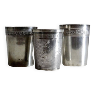 3 silver tumblers