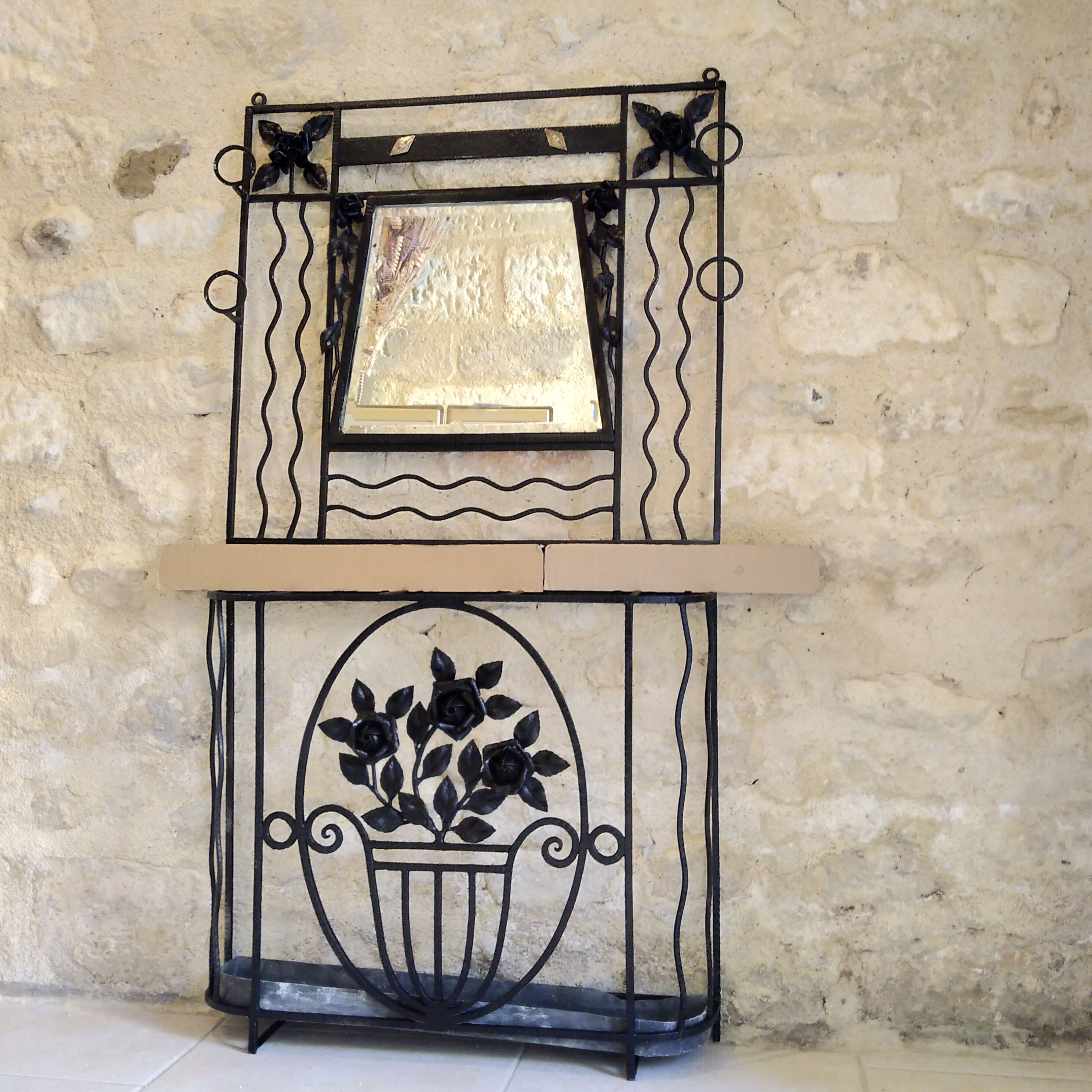 Art deco wrought iron coat holder