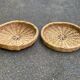 Round basket woven from straw