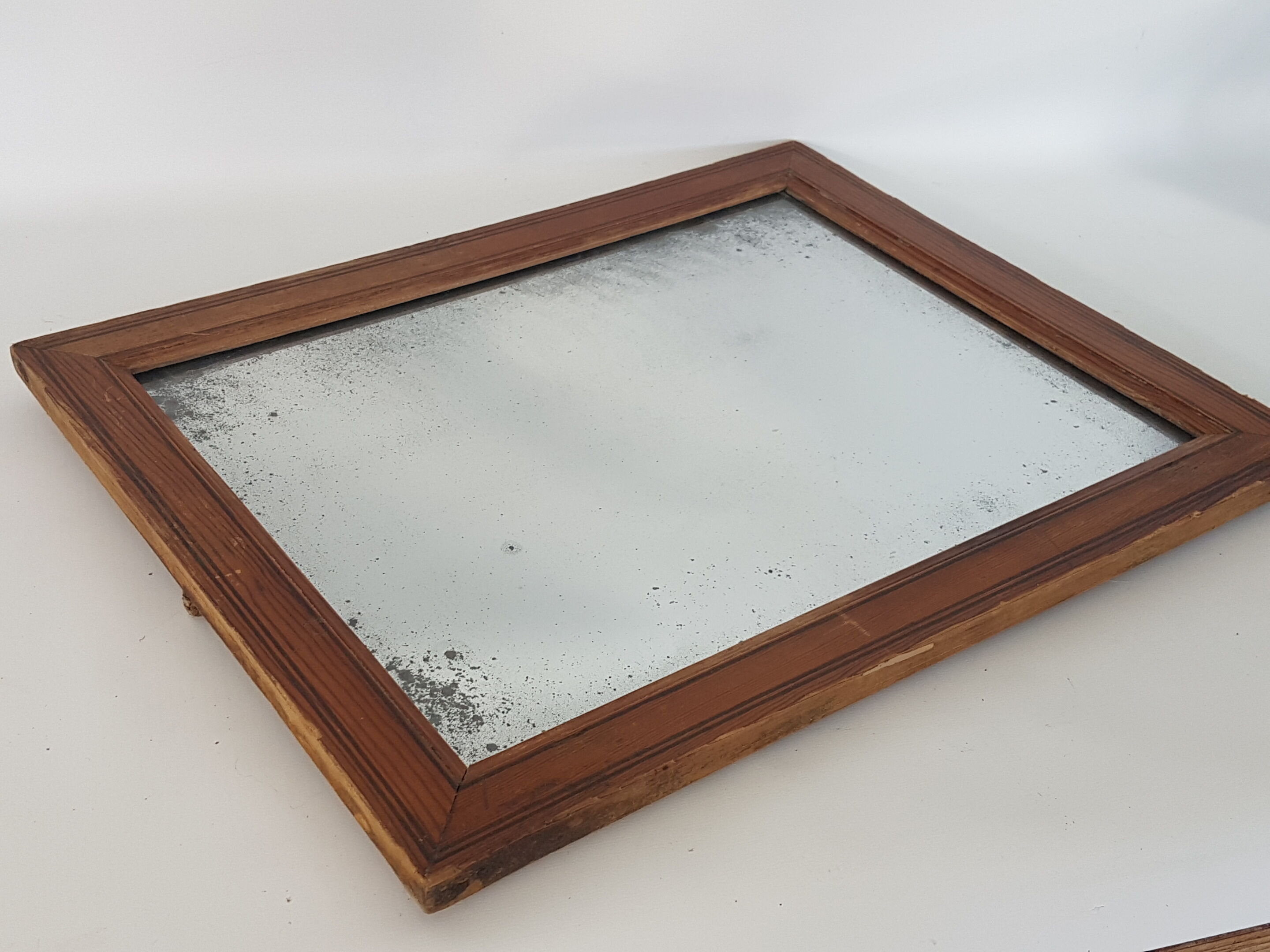 Old mirror in a netwood frame, 19th, 42 x 33 cm
