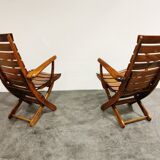 Pair of wooden folding garden chairs with table, 1950s
