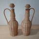 Vintage rattan bottle duo