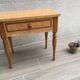 Formica and vintage wood bedside table