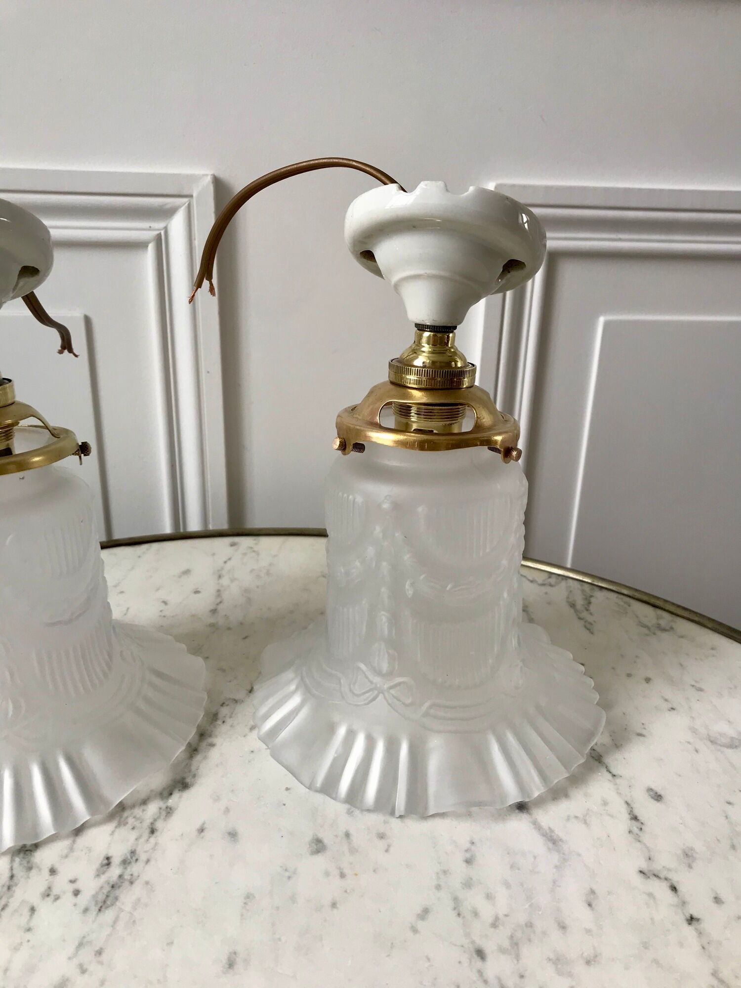 Pair of tulip wall lamps in molded glass on porcelain support 20s