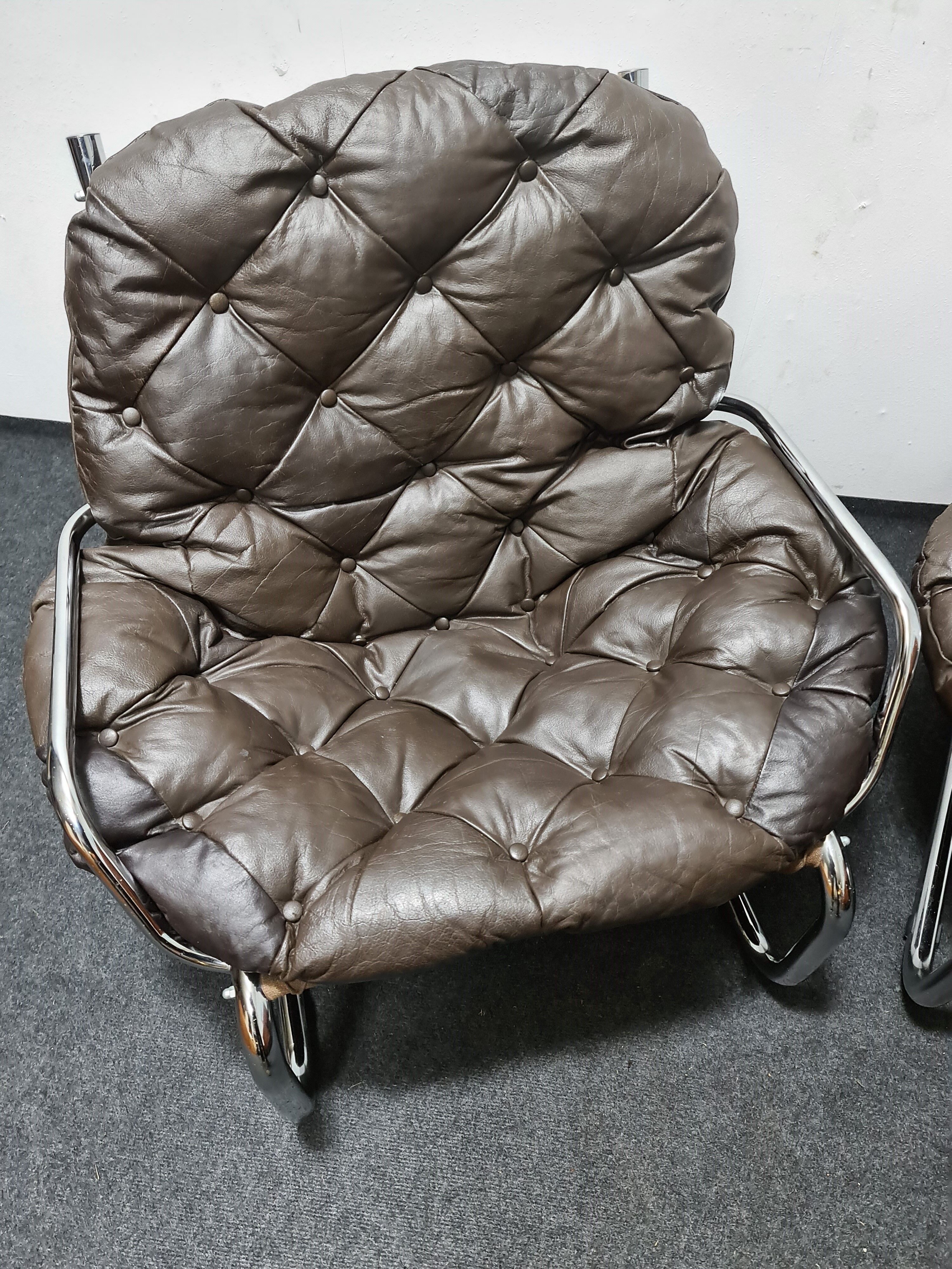 Pair of chrome and leather vintage chairs