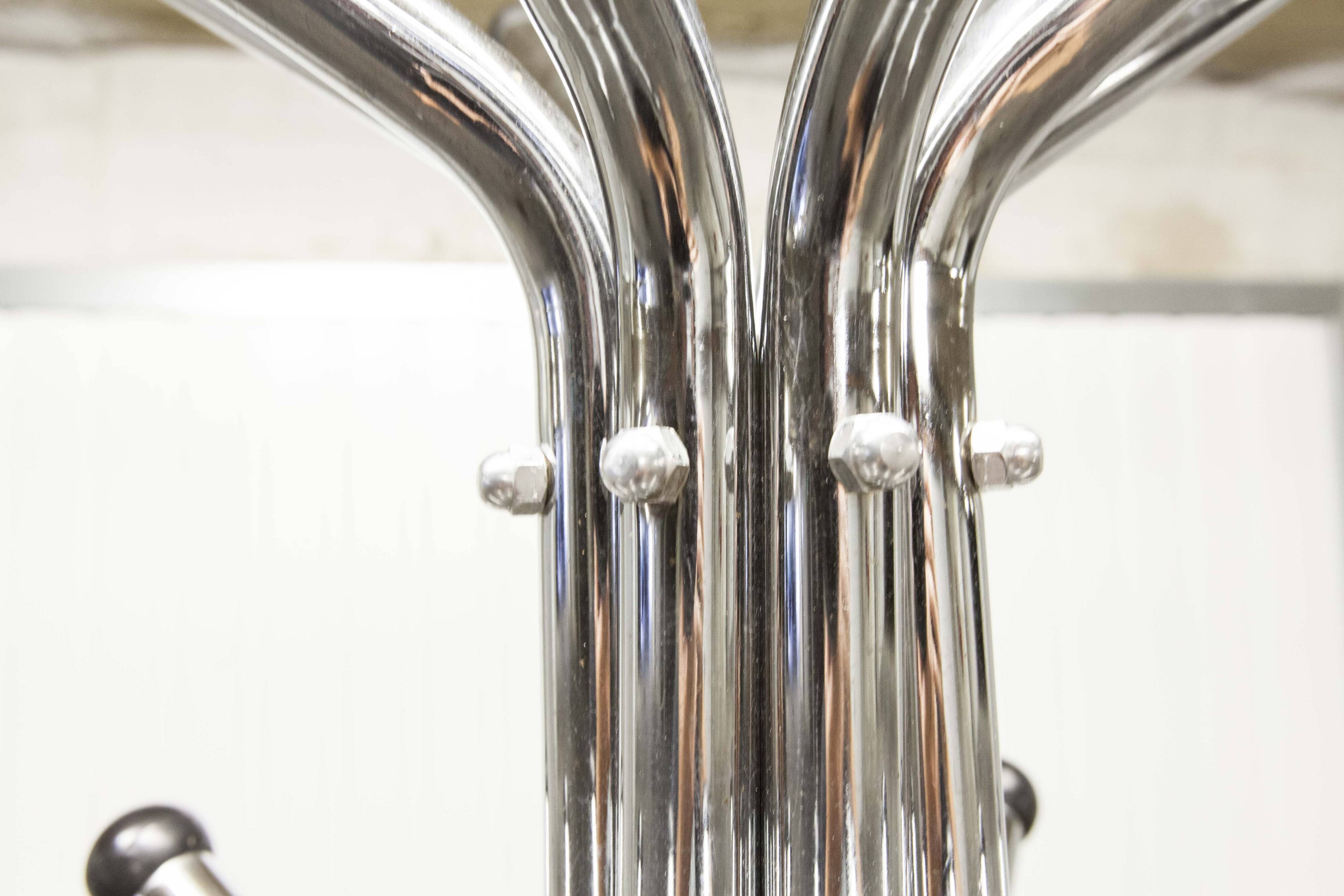1960 parrot coat rack with 16 hooks, industrial chrome metal, rotating.