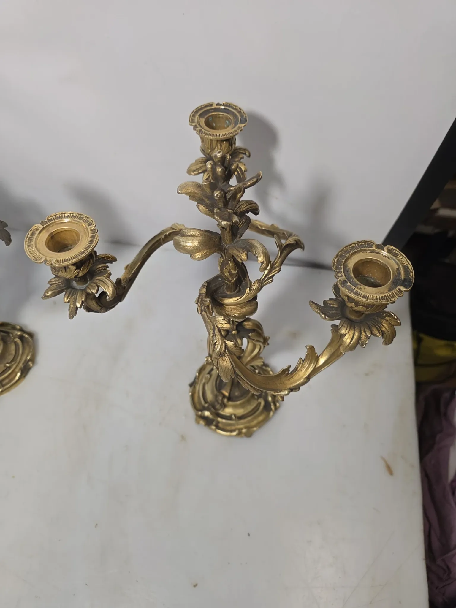 Pair of Louis XV style bronze candlesticks from the 19th century.
