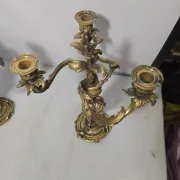 Pair of Louis XV style bronze candlesticks from the 19th century.