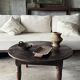 Coffee table, round antique Indonesian teak table with straight legs.