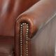 Sheepskin club armchair in English style with brown colour scheme