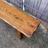 Brutalist bench in dark wood