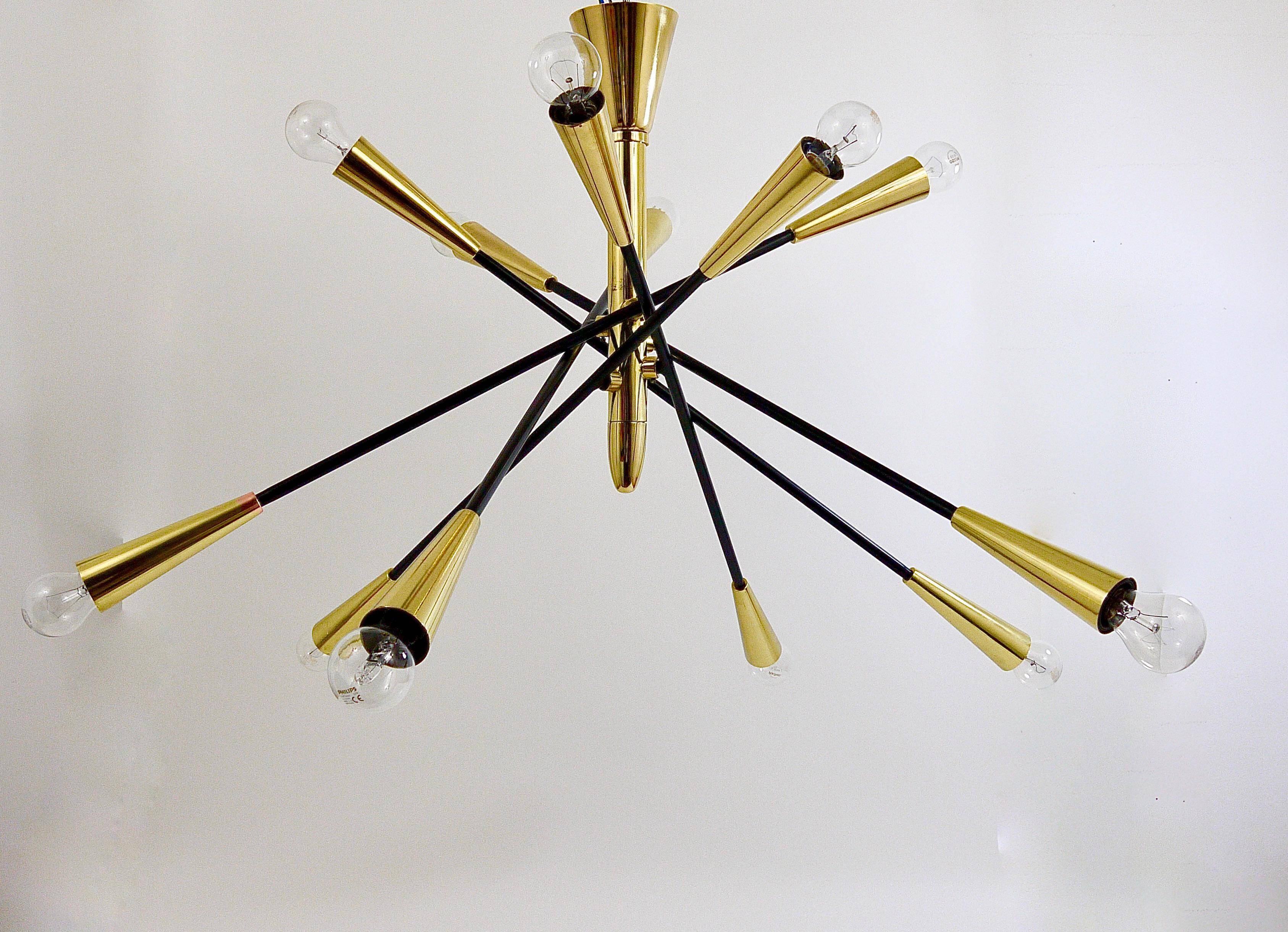 Black and brass articulated Sputnik chandelier in Stilnovo style, Italy, 1950.