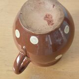 Stoneware pitcher.