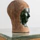 Vintage ceramic vase from the 1980s, sculptural head shape with a green glazed face, terracotta art object.
