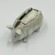 Vintage mustard pot in porcelain shaped like a pig.