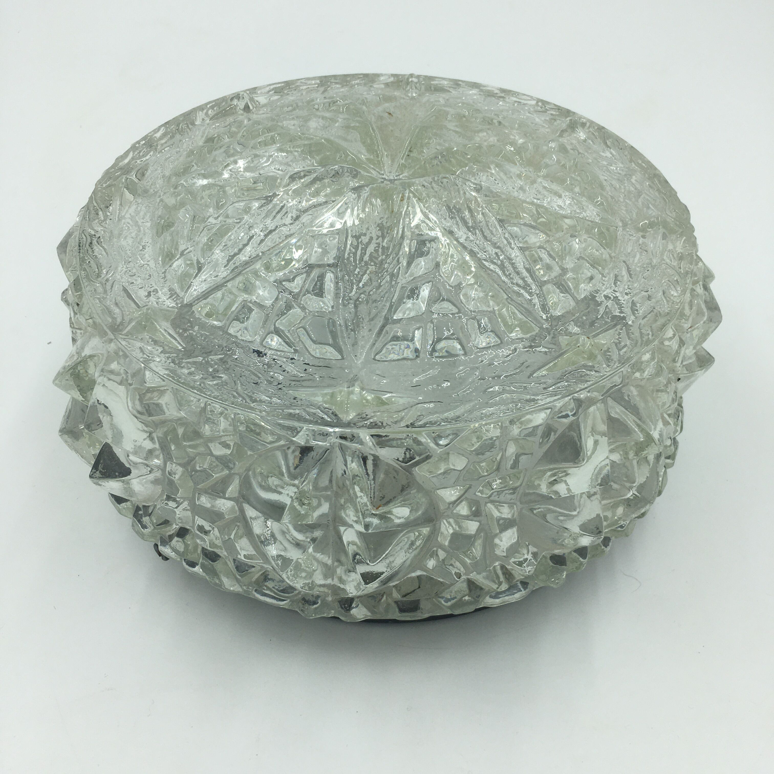 Ceiling lamp in molded glass with relief
