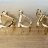 Series of 3 gilded metal hooks 40s 50s